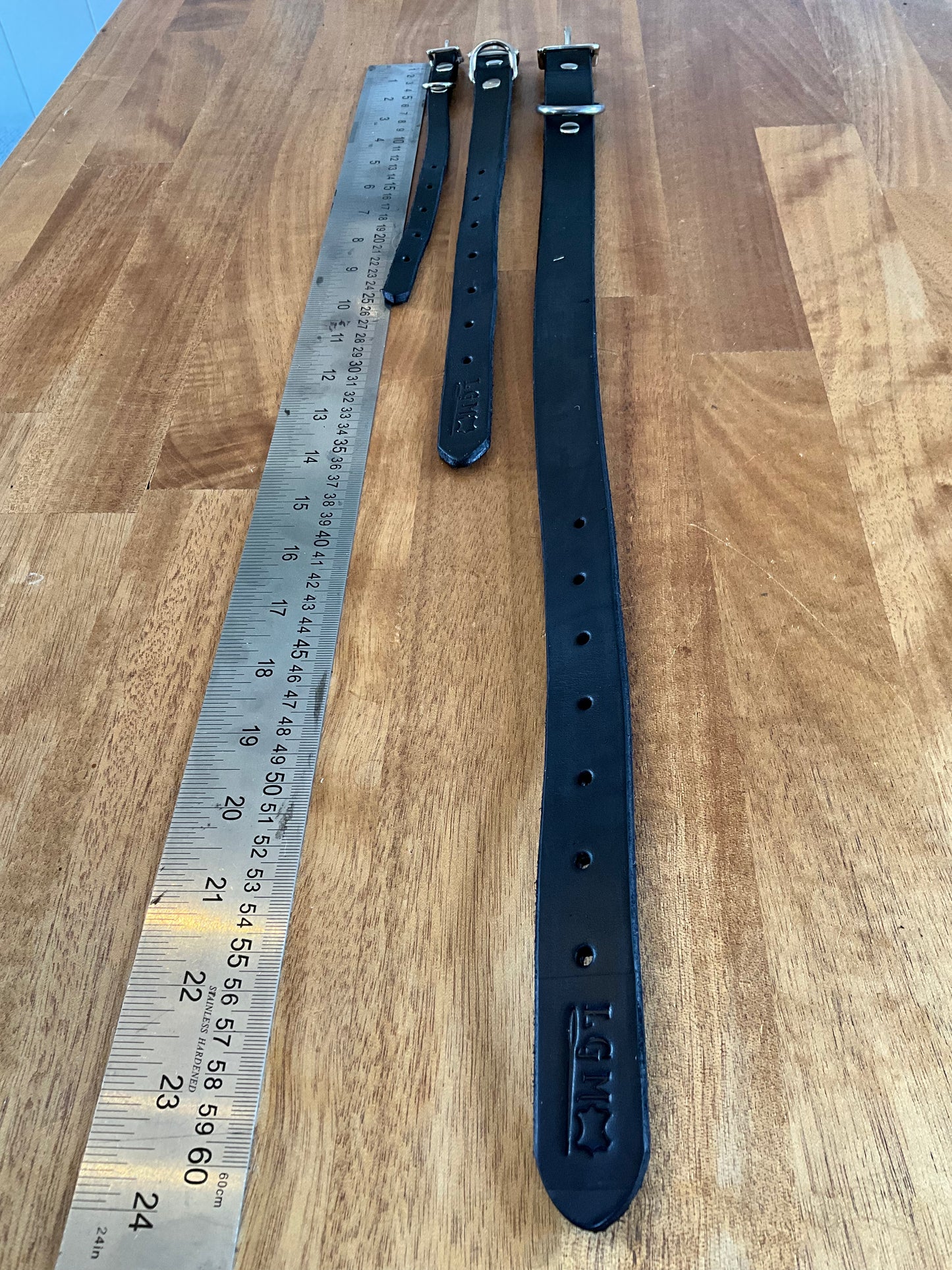 Handmade leather dog collars in black, three sizes from N’hay Gear